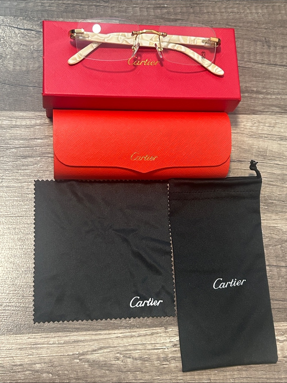 Cartier Rimless Glasses in Cream and Gold Accents